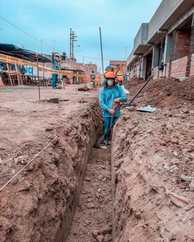A worker in a trench on a utility job